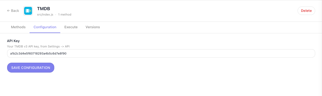 The TMDB Configuration tab showing the single API Key field rendered from the configItems declaration, with its label, description and a Save Configuration button